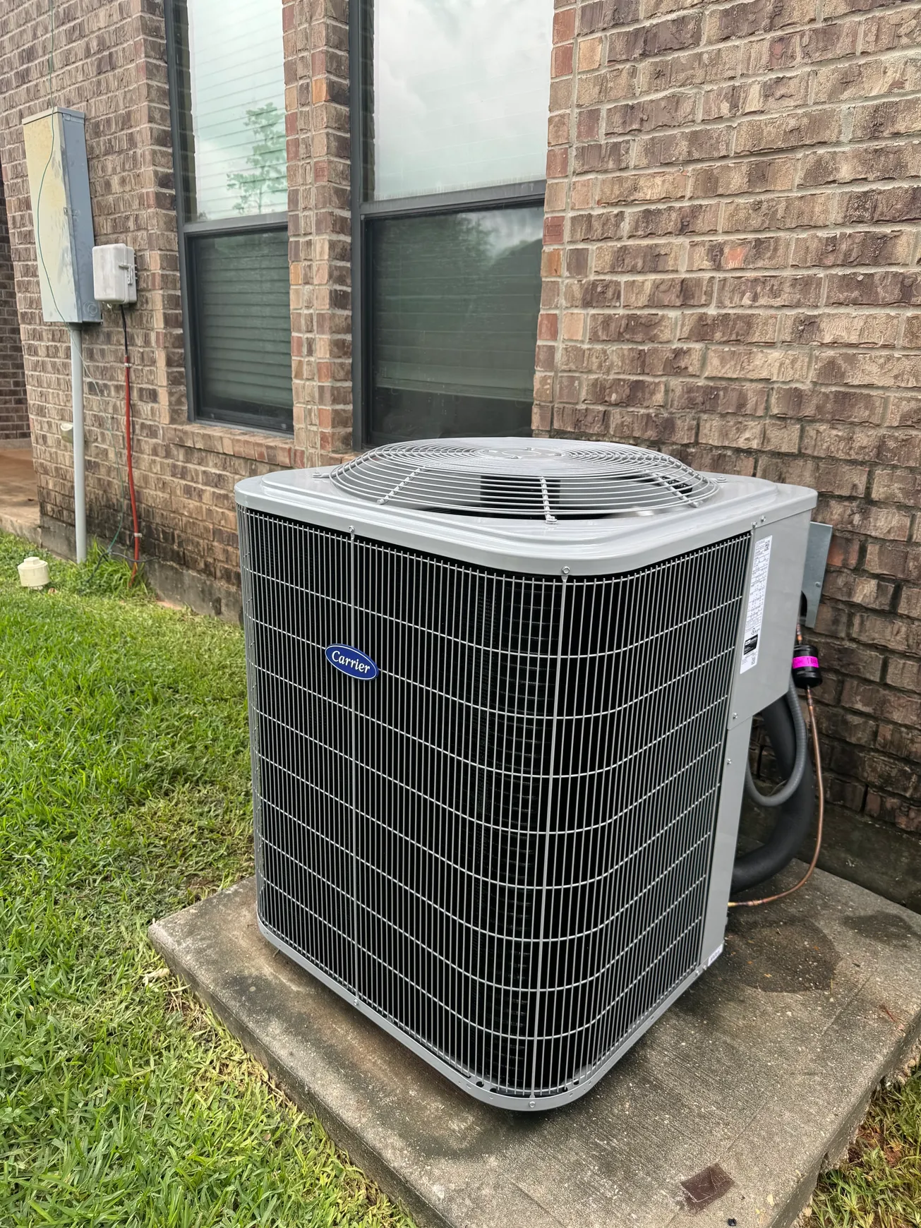 Newly installed Carrier residential AC condenser